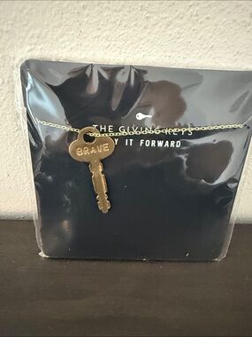 The Giving Keys pay it forward necklace in Brave